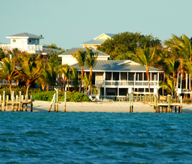 Conch Cottage on quiet island street with private pool.