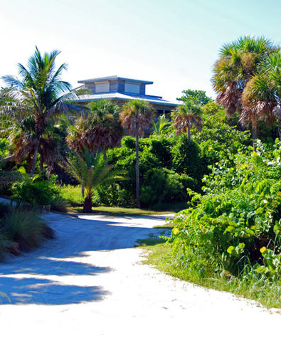 Conch Cottage on quiet island street with private pool.