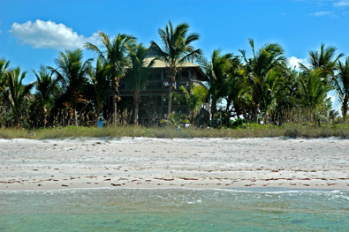 Conch Cottage on quiet island street with private pool.