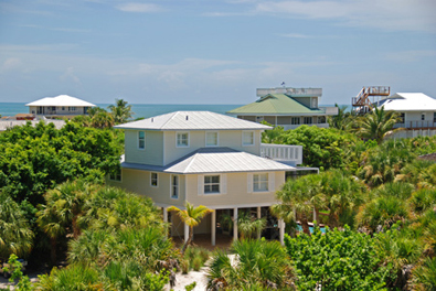 Conch Cottage on quiet island street with private pool.