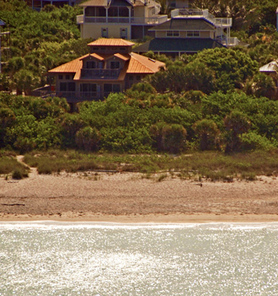 Conch Cottage on quiet island street with private pool.
