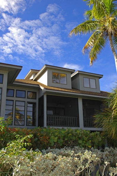 Conch Cottage on quiet island street with private pool.