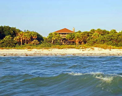 Conch Cottage on quiet island street with private pool.