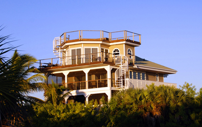 Conch Cottage on quiet island street with private pool.