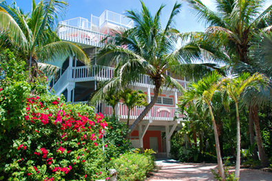 Conch Cottage on quiet island street with private pool.