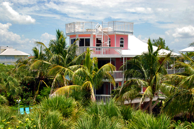 Conch Cottage on quiet island street with private pool.