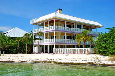 Conch Cottage on quiet island street with private pool.